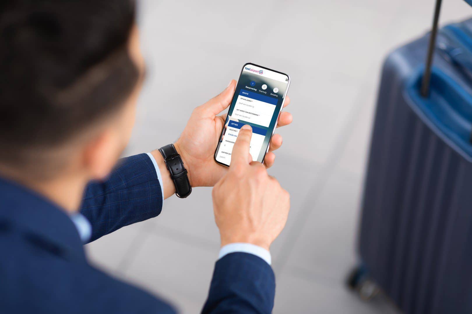 Unrecognizable Man Using Smartphone With Blank Screen While Sitting With Luggage Outdoors - Taxi Airport 24